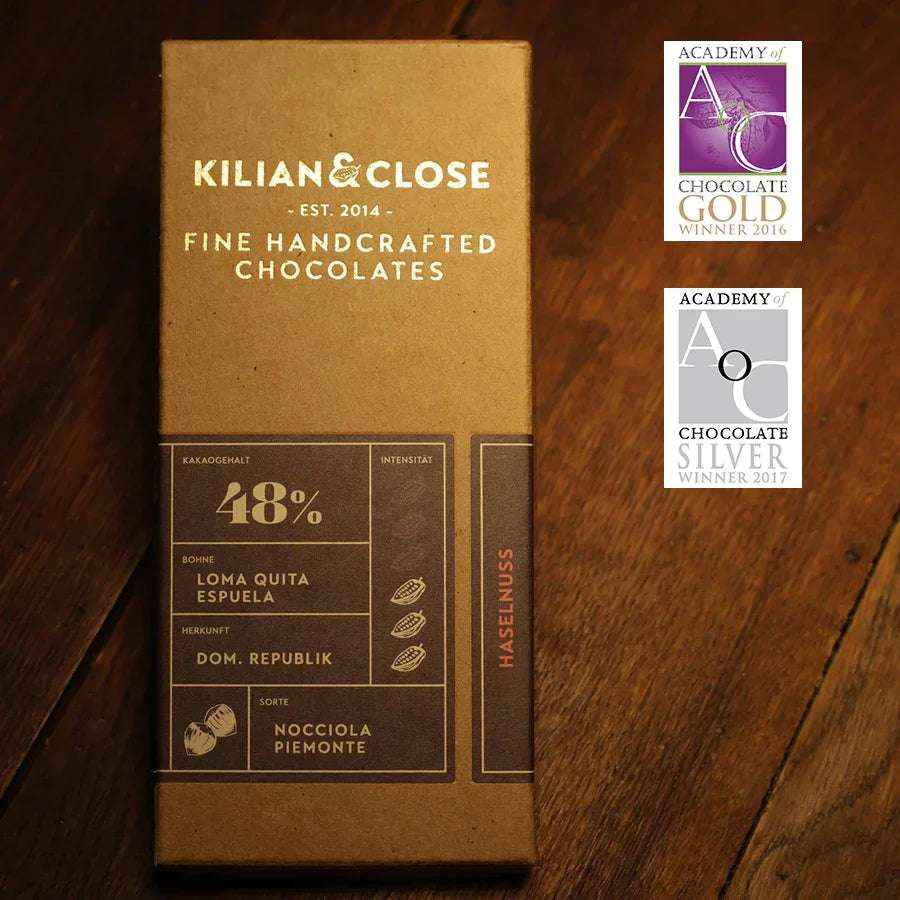 Vysokoprocentní mléčná čokoláda 48% s lískovými oříšky z Piemontu BIO - Kilian & Close