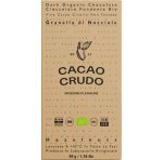 Obal tmavé organické čokolády s lískovými oříšky a informacemi o produktu.